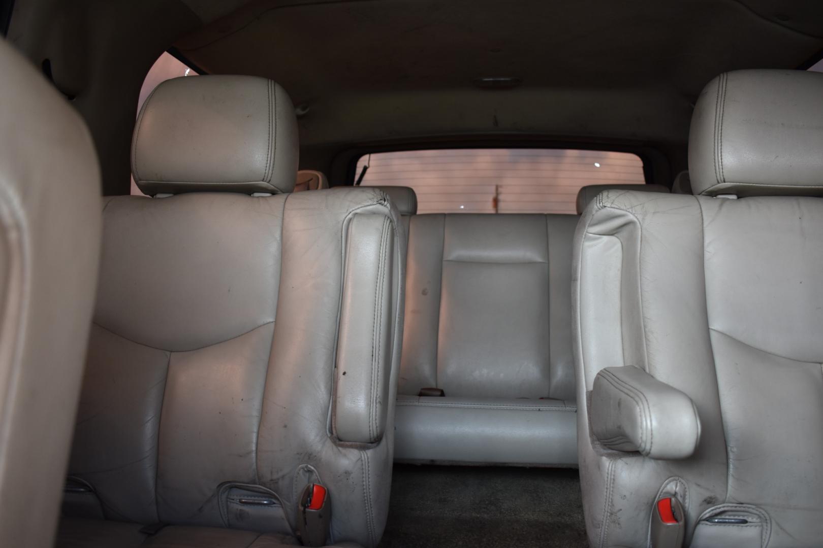 2003 Gold /Tan Chevrolet Suburban (1GNEC16Z23J) with an V8, 5.3.0L engine, 4 SPEED AUTOMATIC transmission, located at 5925 E. BELKNAP ST., HALTOM CITY, TX, 76117, (817) 834-4222, 32.803799, -97.259003 - Buying a 2003 Chevrolet Suburban can offer several benefits, including: Spaciousness: The Suburban is known for its ample interior space, making it great for large families, hauling cargo, or even converting into a camper. Towing Capacity: It's equipped with a robust engine and frame, allowing it - Photo#17